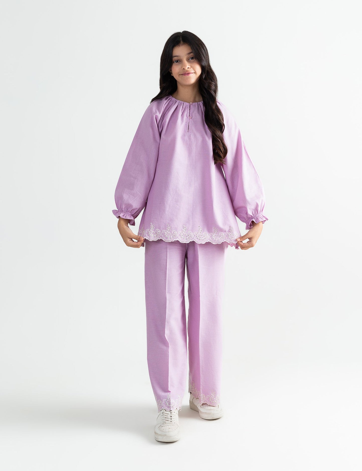 EMBROIDERED HEM TOP