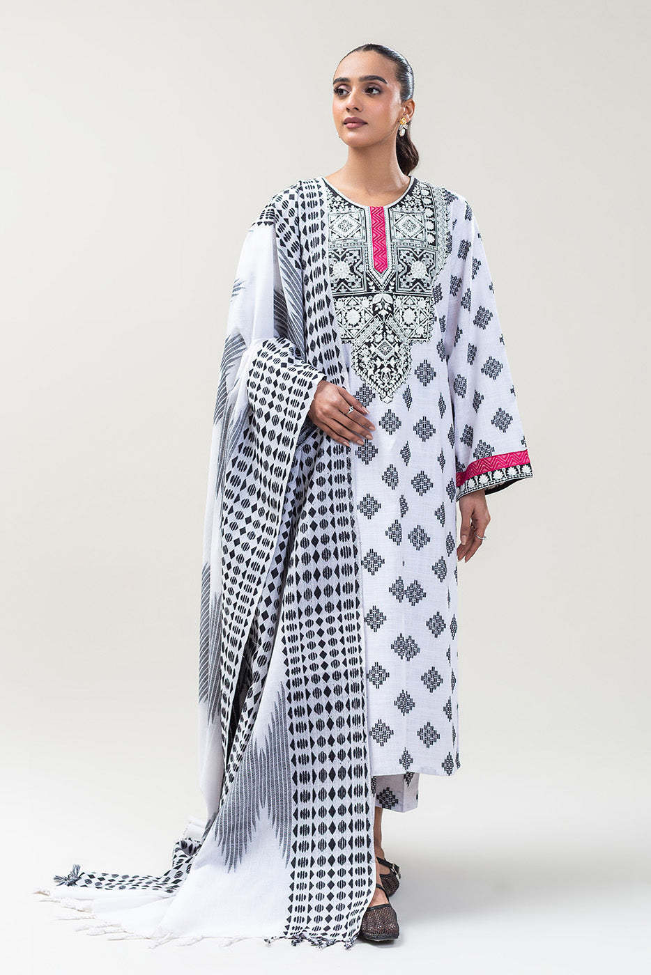 2 PIECE EMBROIDERED KHADDAR JACQUARD SUIT (PRET)