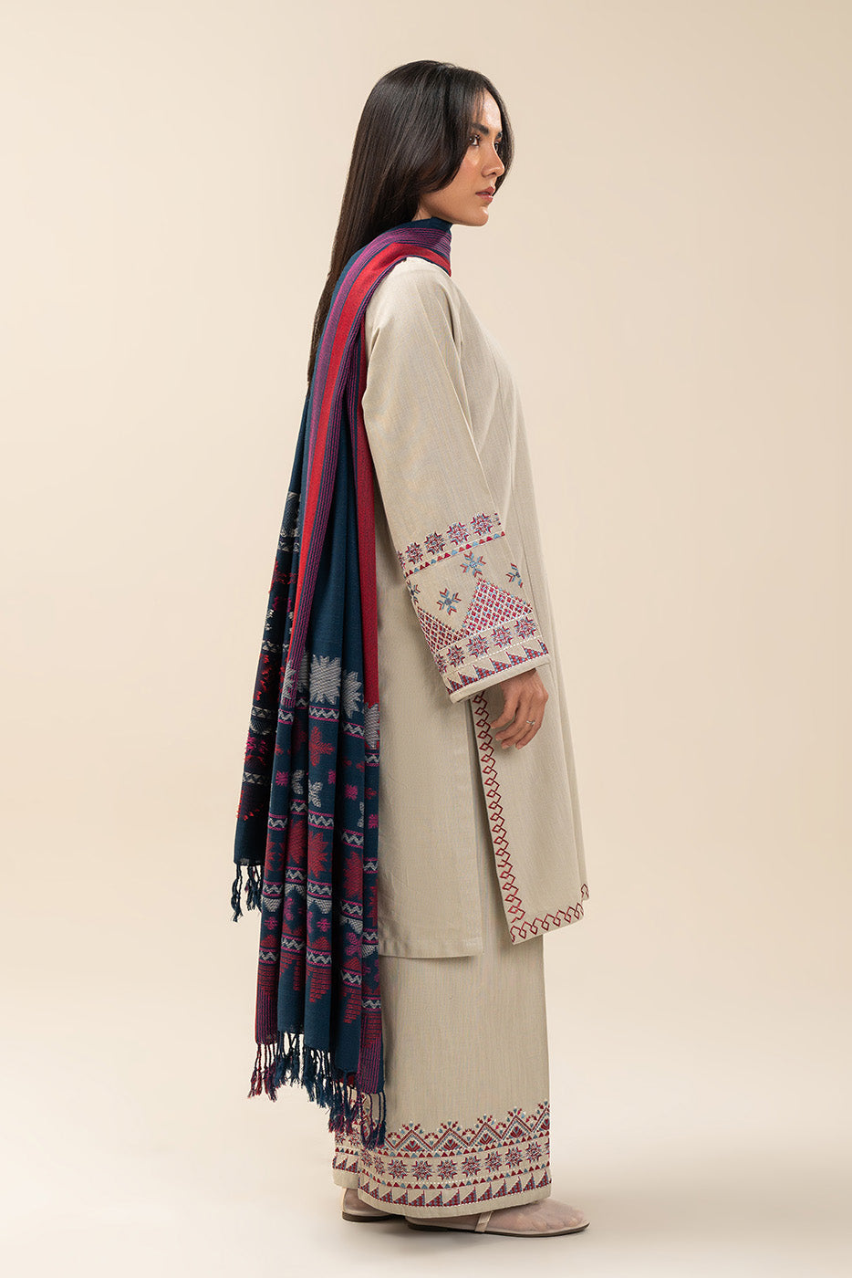 2 PIECE EMBROIDERED SLUB KHADDAR SUIT (PRET)